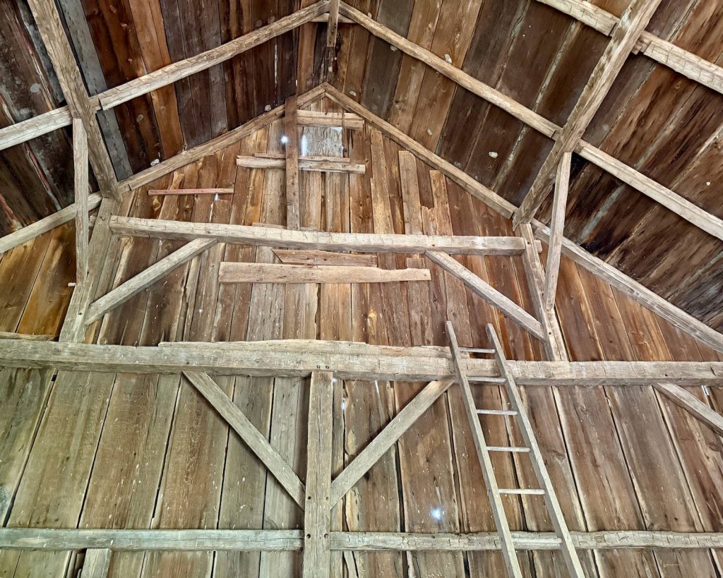 gunstock-post frame gable wall of a barn
